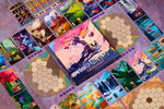 Harmonies Crescendo board game spread out on a textured surface, featuring a central illustrated game box surrounded by colourful cards, hexagonal tiles, and game components.