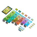 Mountain Goats legacy board game set arranged on a plain white background, including a green game box, colorful landscape tiles, small character pieces, and cards. The box art shows the title 'The Great Wave: Labyrinth'.